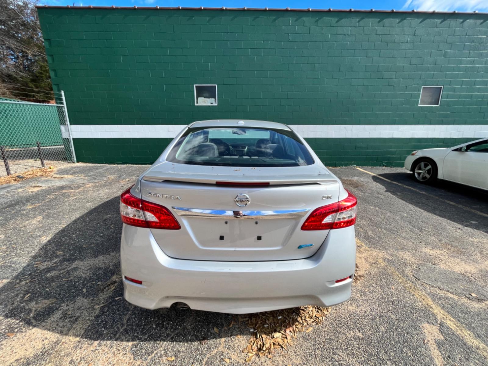 2013 Nissan Sentra S 6MT (3N1AB7AP4DL) with an 2.0L L4 DOHC 16V engine, 6-Speed Manual transmission, located at 307 West Marshall Avenue, Longview, TX, 75601, (903) 753-3091, 32.500828, -94.742577 - Photo #4