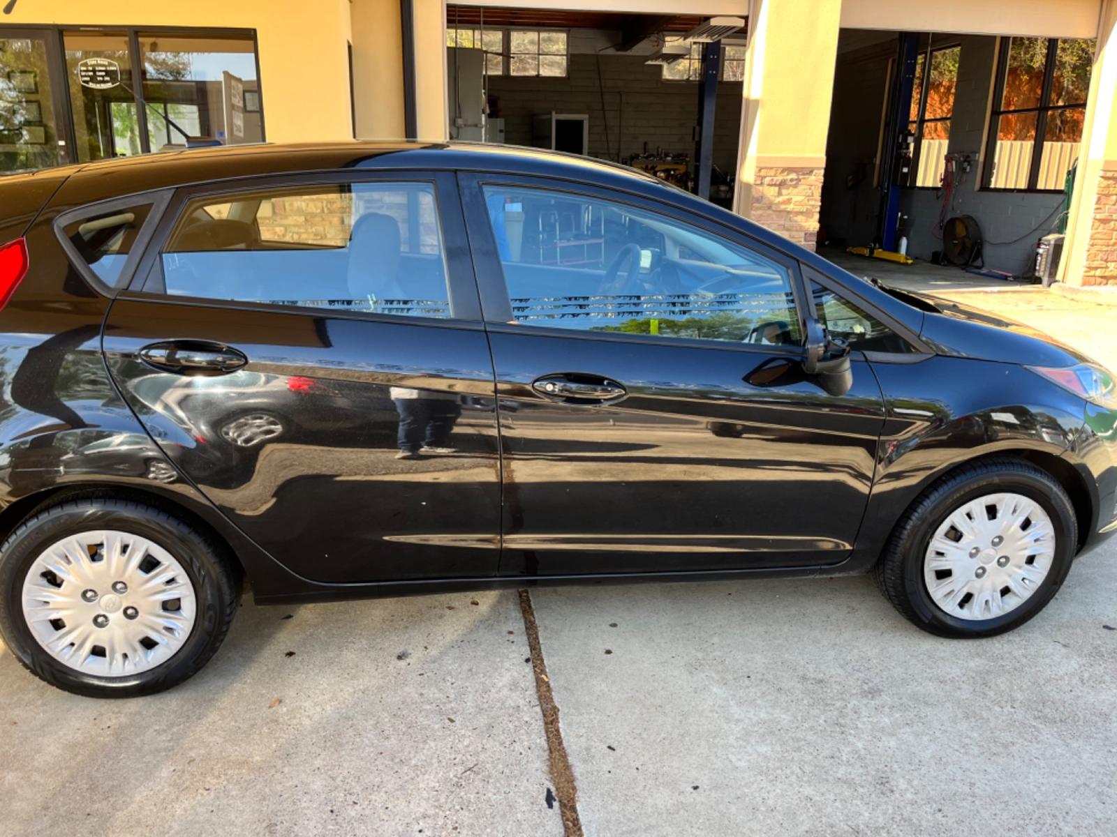 2014 Ford Fiesta S Hatchback (3FADP4TJ2EM) with an 1.6L L4 DOHC 16V engine, located at 307 West Marshall Avenue, Longview, TX, 75601, (903) 753-3091, 32.500828, -94.742577 - Photo #1