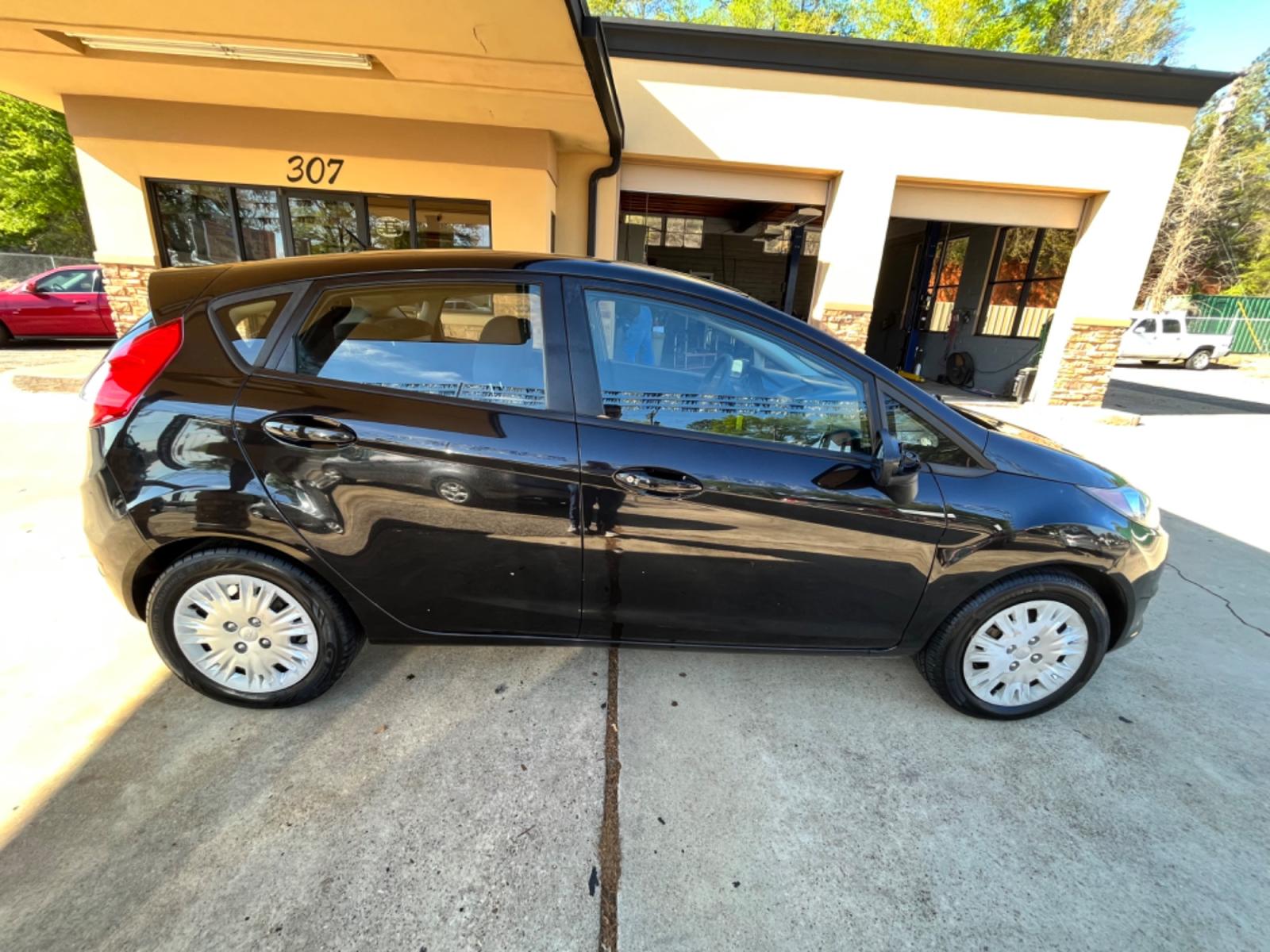 2014 Ford Fiesta S Hatchback (3FADP4TJ2EM) with an 1.6L L4 DOHC 16V engine, located at 307 West Marshall Avenue, Longview, TX, 75601, (903) 753-3091, 32.500828, -94.742577 - Photo #2