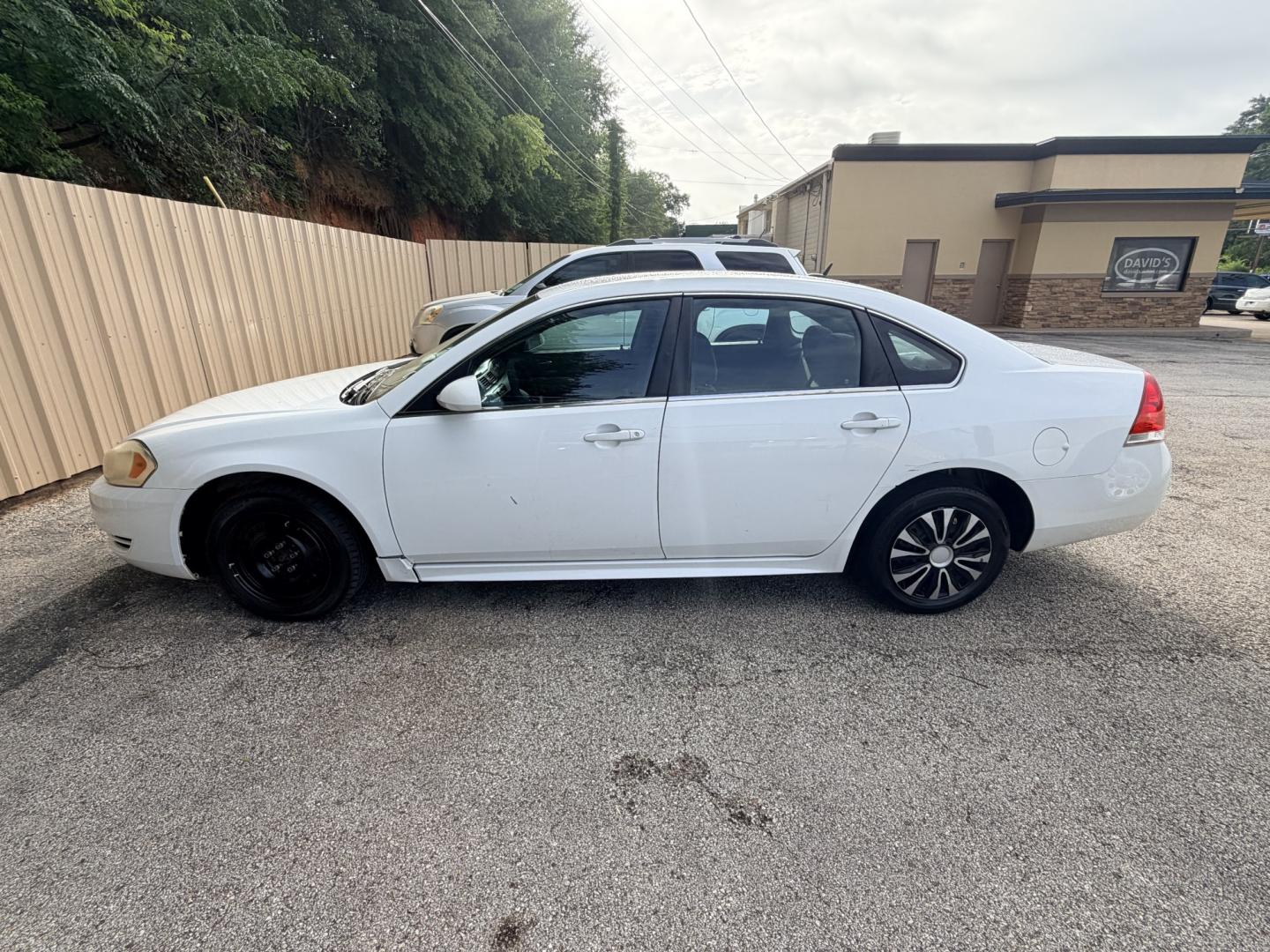 2010 White Chevrolet Impala LS (2G1WA5EK1A1) with an 3.5L V6 OHV 16V FFV engine, 4-Speed Automatic Overdrive transmission, located at 307 West Marshall Avenue, Longview, TX, 75601, (903) 753-3091, 32.500828, -94.742577- Photo#1