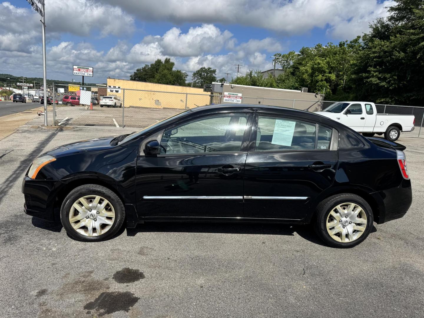2012 BLACK Nissan Sentra 2.0 (3N1AB6AP2CL) with an 2.0L L4 DOHC 16V engine, Continuously Variable Transmission transmission, located at 307 West Marshall Avenue, Longview, TX, 75601, (903) 753-3091, 32.500828, -94.742577 - Photo#2