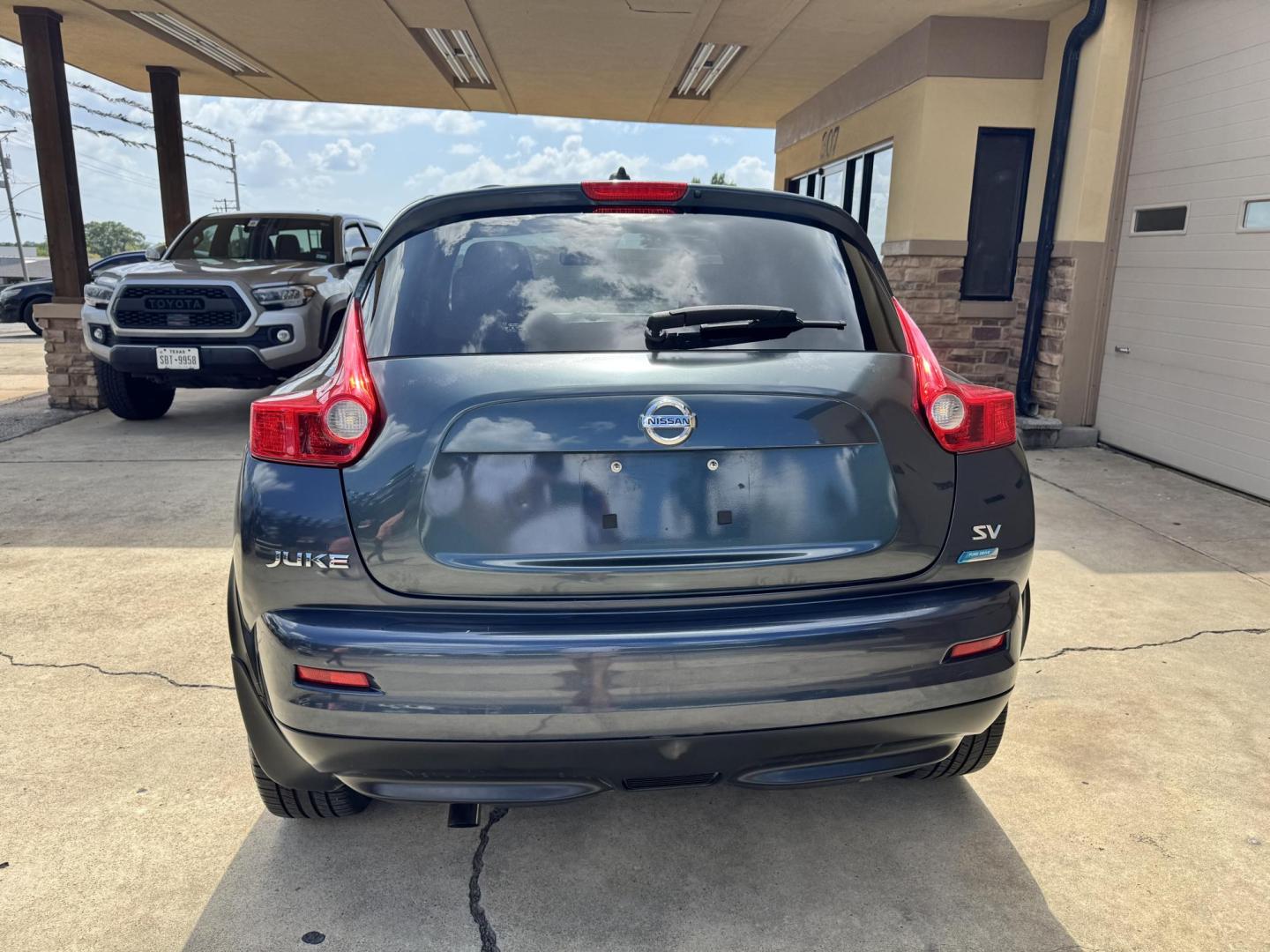 2014 BLUE Nissan Juke S FWD (JN8AF5MR6ET) with an 1.6L L4 DOHC 16V engine, Continuously Variable Transmission transmission, located at 307 West Marshall Avenue, Longview, TX, 75601, (903) 753-3091, 32.500828, -94.742577 - Photo#3
