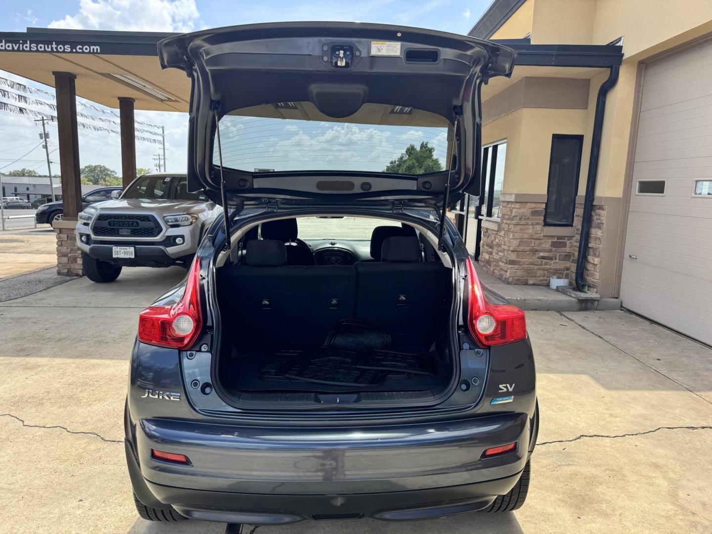 2014 BLUE Nissan Juke S FWD (JN8AF5MR6ET) with an 1.6L L4 DOHC 16V engine, Continuously Variable Transmission transmission, located at 307 West Marshall Avenue, Longview, TX, 75601, (903) 753-3091, 32.500828, -94.742577 - Photo#6