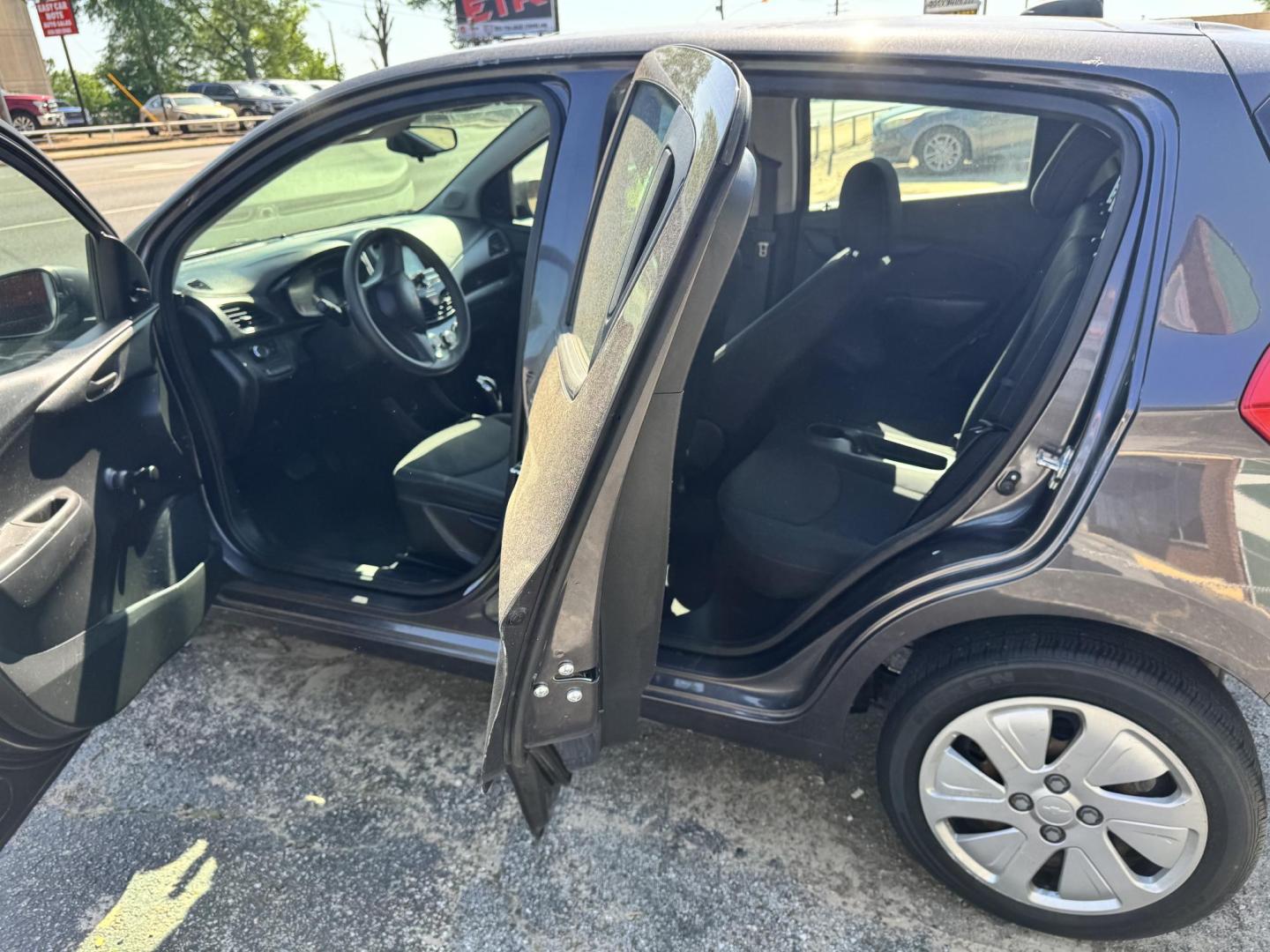 2016 GRAY Chevrolet Spark LS CVT (KL8CB6SA7GC) with an 1.4L L4 16V DOHC engine, CVT transmission, located at 307 West Marshall Avenue, Longview, TX, 75601, (903) 753-3091, 32.500828, -94.742577 - Photo#4
