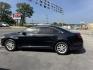 2014 BLACK Ford Taurus SE FWD (1FAHP2D82EG) with an 3.5L V6 DOHC 24V engine, 6-Speed Automatic transmission, located at 307 West Marshall Avenue, Longview, TX, 75601, (903) 753-3091, 32.500828, -94.742577 - Photo#2