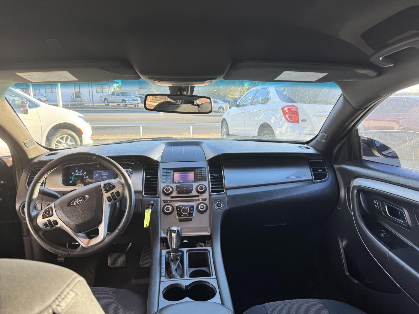 2018 BLACK Ford Taurus SEL FWD (1FAHP2E81JG) with an 3.5L V6 DOHC 24V engine, 6A transmission, located at 307 West Marshall Avenue, Longview, TX, 75601, (903) 753-3091, 32.500828, -94.742577 - Photo#4