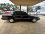 2011 BLACK Ford Crown Victoria Police Interceptor (2FABP7BV7BX) with an 4.6L V8 SOHC 16V FFV engine, 4-Speed Automatic transmission, located at 307 West Marshall Avenue, Longview, TX, 75601, (903) 753-3091, 32.500828, -94.742577 - Photo#2