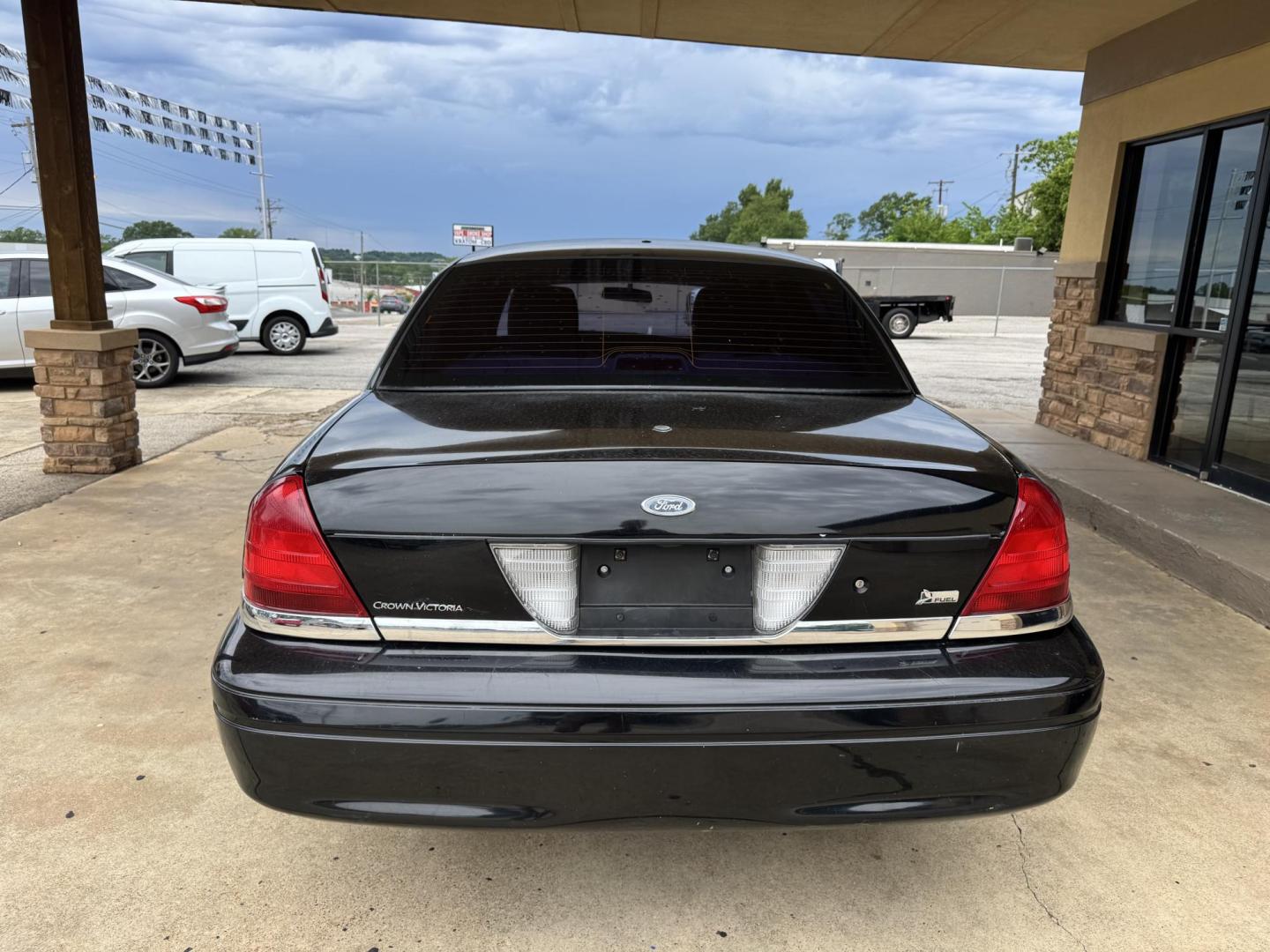 2011 BLACK Ford Crown Victoria Police Interceptor (2FABP7BV7BX) with an 4.6L V8 SOHC 16V FFV engine, 4-Speed Automatic transmission, located at 307 West Marshall Avenue, Longview, TX, 75601, (903) 753-3091, 32.500828, -94.742577 - Photo#3