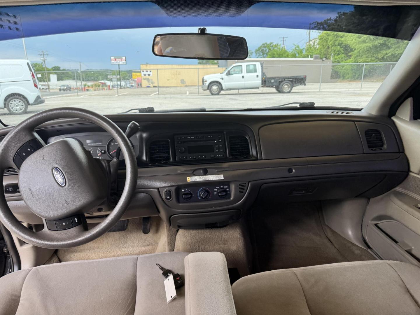 2011 BLACK Ford Crown Victoria Police Interceptor (2FABP7BV7BX) with an 4.6L V8 SOHC 16V FFV engine, 4-Speed Automatic transmission, located at 307 West Marshall Avenue, Longview, TX, 75601, (903) 753-3091, 32.500828, -94.742577 - Photo#5