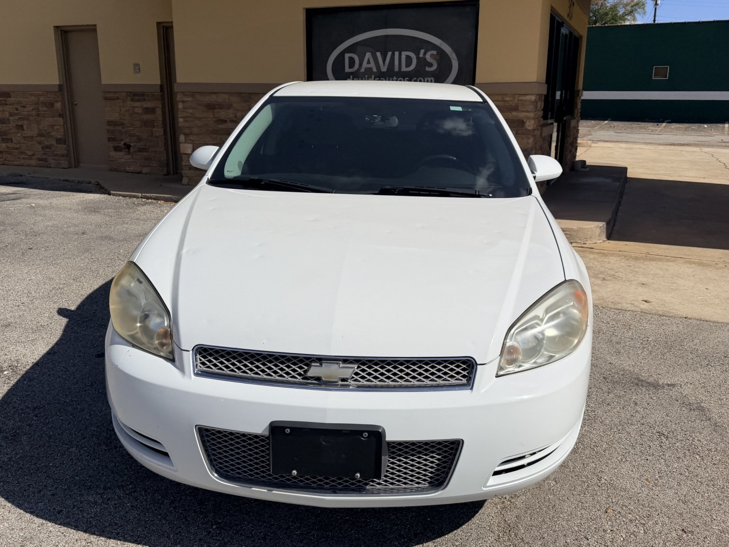 2014 WHITE Chevrolet Impala LS (2G1WA5E39E1) with an 3.6L V6 DOHC 16V FFV engine, 6-Speed Automatic transmission, located at 307 West Marshall Avenue, Longview, TX, 75601, (903) 753-3091, 32.500828, -94.742577- Photo#0