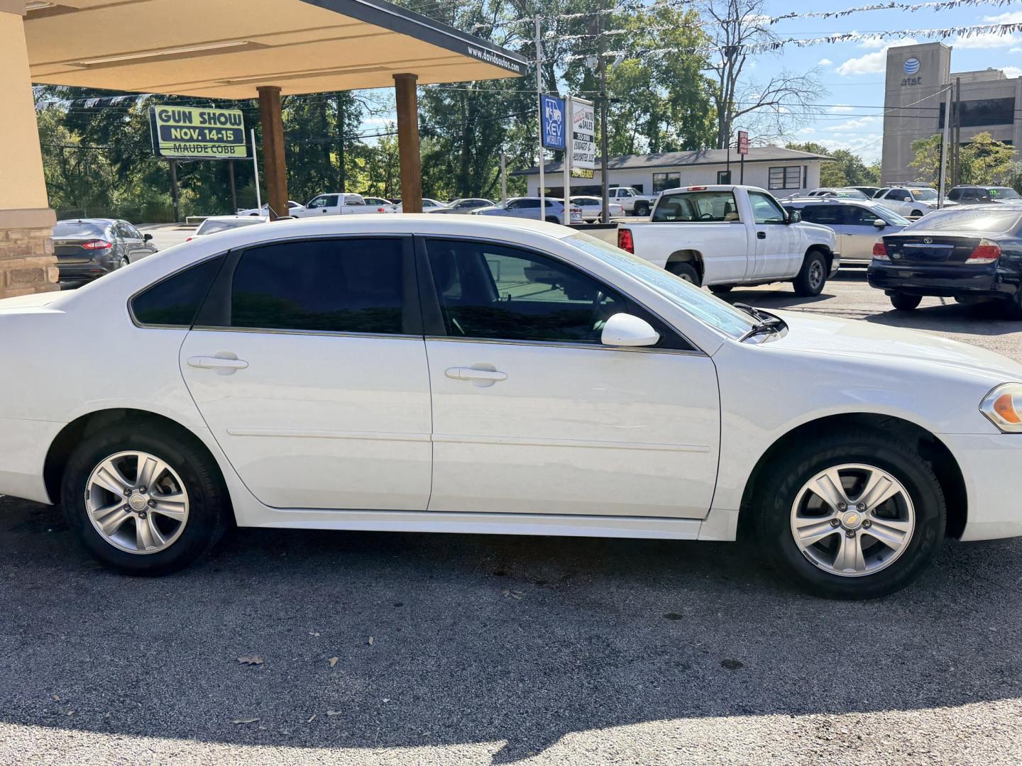 2014 WHITE Chevrolet Impala LS (2G1WA5E39E1) with an 3.6L V6 DOHC 16V FFV engine, 6-Speed Automatic transmission, located at 307 West Marshall Avenue, Longview, TX, 75601, (903) 753-3091, 32.500828, -94.742577- Photo#1